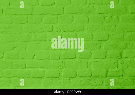 Pastell bright green colored brickstone wall, full frame, image background Stock Photo