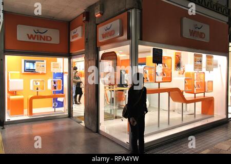 BERGAMO, ITALY - OCTOBER 20, 2012: People visit Wind mobile phone store in Bergamo. Wind has 24 percent market share in Italy mobile phone market (wit Stock Photo
