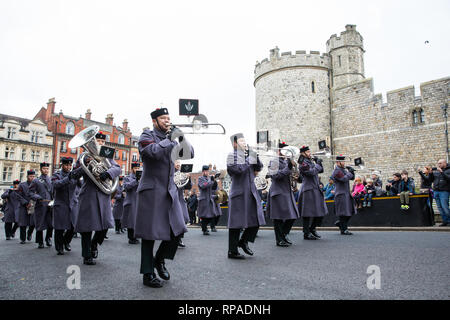 Windsor, UK. 21st February, 2019. The Band of the Brigade of Gurkhas leads 36 Engineer Regiment Queen's Gurkha Engineers in the Changing of the Guard ceremony at Windsor Castle. The Queen's Gurkha Engineers will provide the Windsor Guard until April 12th, for the first time since the celebrations marking 200 years of service to the Crown in 2015. Credit: Mark Kerrison/Alamy Live News Stock Photo