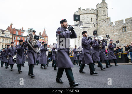 Windsor, UK. 21st February, 2019. The Band of the Brigade of Gurkhas leads 36 Engineer Regiment Queen's Gurkha Engineers in the Changing of the Guard ceremony at Windsor Castle. The Queen's Gurkha Engineers will provide the Windsor Guard until April 12th, for the first time since the celebrations marking 200 years of service to the Crown in 2015. Credit: Mark Kerrison/Alamy Live News Stock Photo