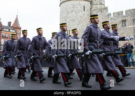 Windsor, UK. 21st February, 2019. 36 Engineer Regiment Queen's Gurkha Engineers, accompanied by the Band of the Brigade of Gurkhas, take part in the Changing of the Guard ceremony at Windsor Castle. The Queen's Gurkha Engineers will provide the Windsor Guard until April 12th, for the first time since the celebrations marking 200 years of service to the Crown in 2015. Credit: Mark Kerrison/Alamy Live News Stock Photo