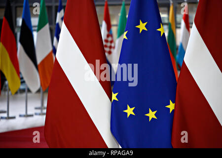 Brussels, Belgium. 21st February 2019. Flags of Latvia and EU flags stand in the European Council . Alexandros Michailidis/Alamy Live News Stock Photo