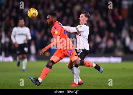 Derby, Derbyshire, UK. 20th Feb 2019. Millwall defender Mahlon Romeo (12) battles with Derby County midfielder Harry Wilson (7) during the Sky Bet Championship match between Derby County and Millwall at the Pride Park, Derby on Wednesday 20th February 2019. (Credit: MI News | Alamy) Credit: MI News & Sport /Alamy Live News Stock Photo