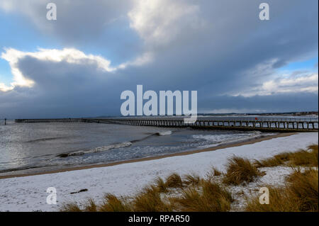 Snow on the Beach at Blyth, Northumberland, UK Stock Photo