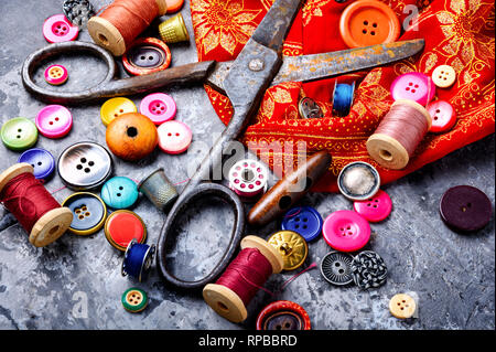 Composition with threads and sewing accessories.Sewing kit Stock Photo