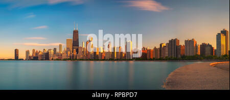 Chicago skyline at sunset viewed from North Avenue Beach Stock Photo