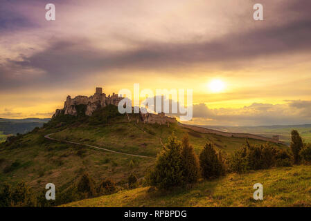 Sunset over the ruins of Spis Castle in Slovakia Stock Photo
