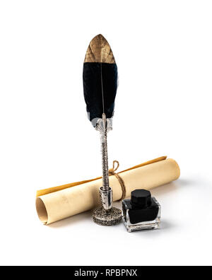 feather pen with inkwell and old parchment roll isolated on white background Stock Photo