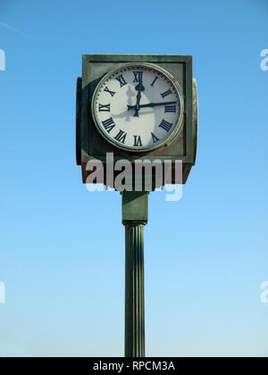 A clock on the Hastings seafront Stock Photo