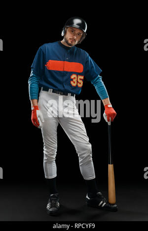 Hitter posing on black background Stock Photo