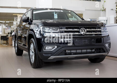 Russia, Izhevsk - February 15, 2019: Showroom Volkswagen. New Teramont in dealer showroom. Famous world brand. Stock Photo