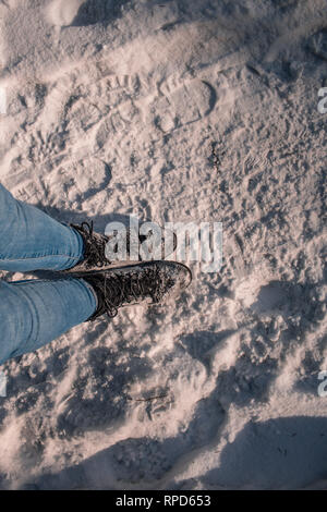 feet on snow, walk on snowy ground Stock Photo