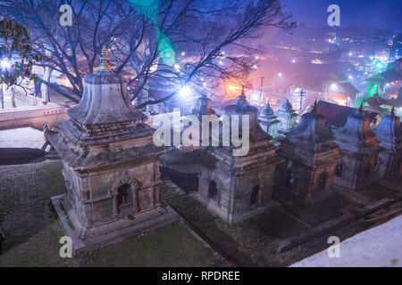 Hindu temple Pashupatinath at night light, Votive temples and shrines in a row at Pashupatinath Temple Kathmandu Nepal. Stock Photo