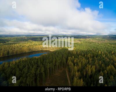 Low level clouds over beautiful landscape of Mazury region during autumn season - Kacze Lake and Krzywa Kuta Lake, Poland Stock Photo