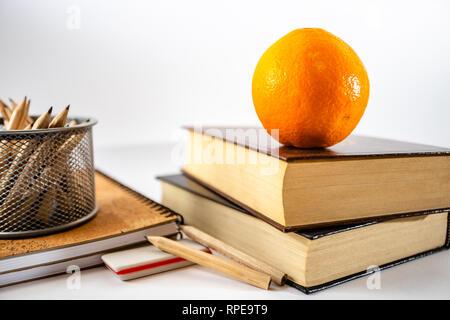 School supplies on table in white background. Stock Photo