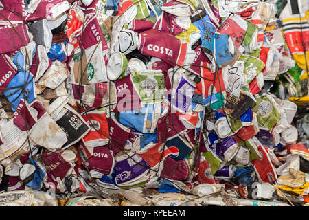 A pile of currently non-recyclable paper coffee cups from a selection of UK outlets Stock Photo