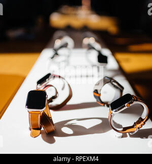 PARIS, FRANCE - OCT 26, 2018: Hero object of the latest Apple Watch Series 4 in Apple Store Computers - focus on Hermes Luxury Watch Stock Photo