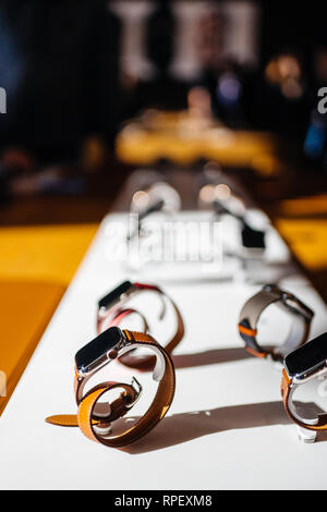 PARIS, FRANCE - OCT 26, 2018: Hero object of the latest Apple Watch Series 4 in Apple Store Computers - focus on Hermes Luxury Watch Stock Photo