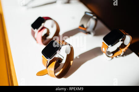 PARIS, FRANCE - OCT 26, 2018: Hero object of the latest Apple Watch Series 4 in Apple Store Computers - focus on Hermes Luxury Watch Stock Photo