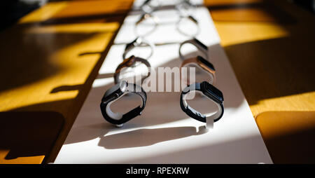 PARIS, FRANCE - OCT 26, 2018: Hero object of the latest Apple Watch Series 4 in Apple Store Computers - focus on black aluminum watch Stock Photo