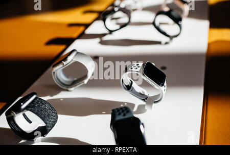 PARIS, FRANCE - OCT 26, 2018: Hero object of the latest Apple Watch Series 4 in Apple Store Computers - focus on gray Nike watch Stock Photo