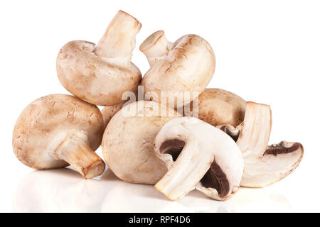 A bunch of champignon mushrooms isolated on white background Stock Photo