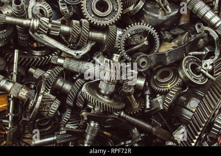 A lot of broken gears and shafts in the garbage box Stock Photo