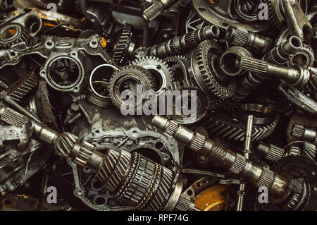 A lot of broken gears and shafts in the garbage box Stock Photo