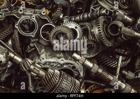 A lot of broken gears and shafts in the garbage box Stock Photo