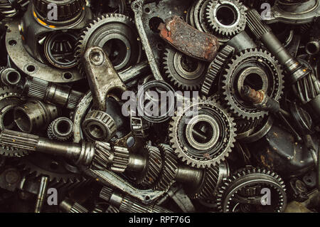 A lot of broken gears and shafts in the garbage box Stock Photo