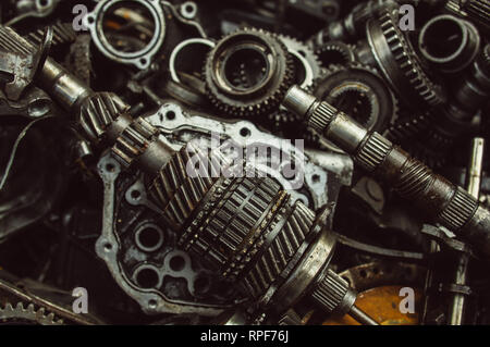 A lot of broken gears and shafts in the garbage box Stock Photo