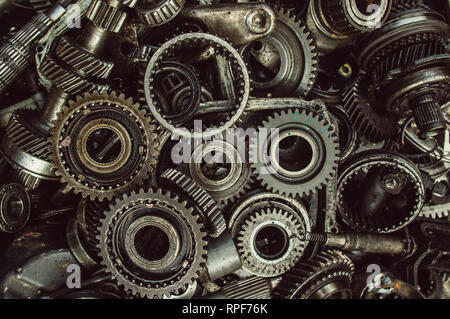 A lot of broken gears and shafts in the garbage box Stock Photo