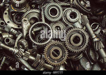 A lot of broken gears and shafts in the garbage box Stock Photo