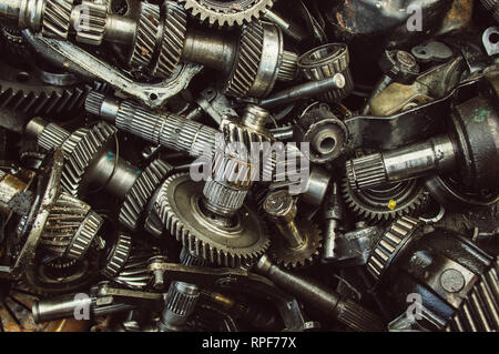 A lot of broken gears and shafts in the garbage box Stock Photo