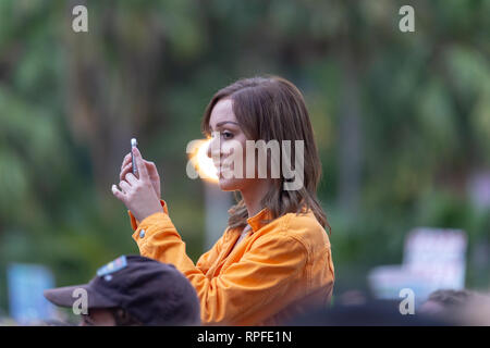 A woman seen enjoying the music concert at the Don't Kill Live Music Protest at Hyde Park in Sydney. Protesters gathered by more than 20,000 against new laws restricting live music and live music festival brought in by the New South Wales government and its Premier Gladys Berejiklian. Stock Photo