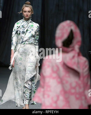 Beijing, China. 1st Apr, 2018. Models wear clothing by designer Xiong Ying during the annual China Fashion Week in Beijing on April 1, 2018. An increasing number of Chinese fashion designers are gaining international recognition for their creativity and modernism. Credit: Todd Lee/ZUMAPRESS.com/ZUMA Wire/Alamy Live News Stock Photo