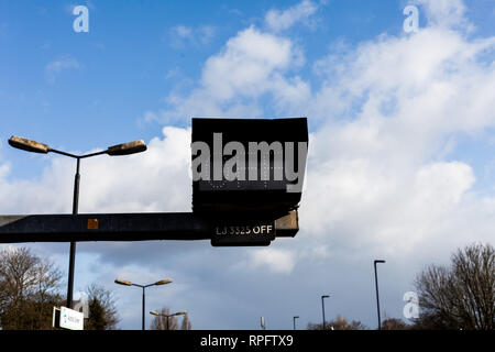 Traffic sign on the road with OFF sign. Traffic security concept with digital sign Stock Photo