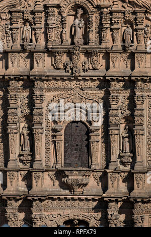 The Baroque Churrigueresque style Josephine entryway on the Iglesia del Carmen church and convent in the historic center on the Plaza del Carmen in the state capital of San Luis Potosi, Mexico. Stock Photo