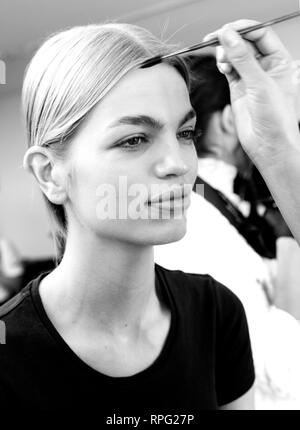 New York, NY - February 08, 2019: Model Daphne Groeneveld prepares backstage for the Cushnie Fall Winter 2019 fashion show during New York Fashion Wee Stock Photo