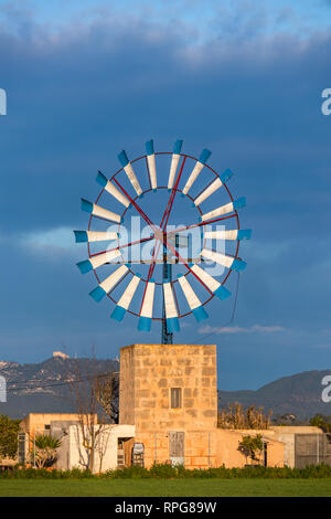 Windmill for water pumping in rural scene near Campos, Mallorca, Balearic Islands, Spain Stock Photo
