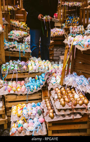 Budapest, Hungary - March 29, 2013: Street stall selling Easter eggs decorated with pretty paintings. Stock Photo