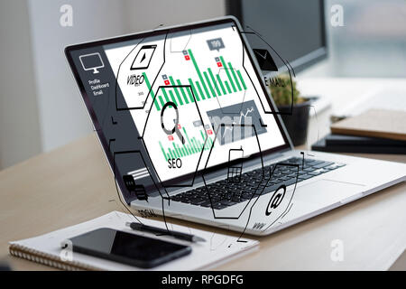 Man using  tablet computer  virtual interface graphic icons network diagram Digital marketing Stock Photo