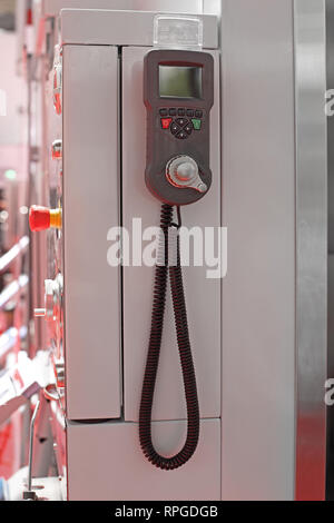 Wired Machine Remote Control With Display in Factory Stock Photo