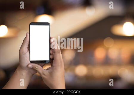 Man hand holding the black smartphone screen mockup Stock Photo