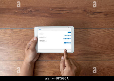man using instant messaging app on mobile chatting with friends Stock Photo