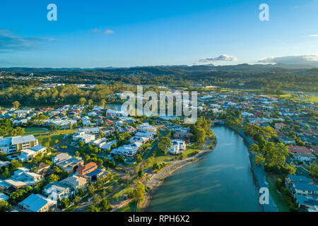 Aerial landscape of Varsity Lakes suburb at sunset. Gold Coast, Queensland, Australia Stock Photo