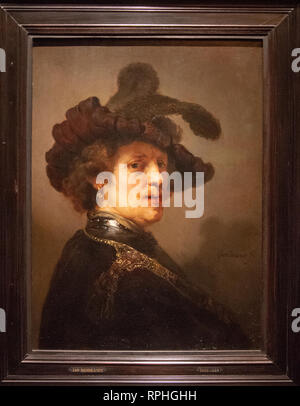 tronie of a man with a feathered beret by painter Rembrandt van Rijn Stock Photo
