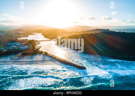 Aerial view of sunset over Tallebudgera creek and Palm Beach suburb in Gold Coast, Queensland, Australia Stock Photo