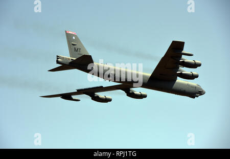 A U.S. Air Force B-52 Stratofortress assigned to the 23rd Expeditionary Bomb Squadron from Andersen Air Force Base, Guam performs a flyover during the opening ceremonies of Aero India 2019 at Air Force Station Yelahanka, India Feb. 20, 2019. The U.S. is honored to participate in this year’s exhibition and is committed to strengthening its partnership with India while furthering military-to-military relationships and cooperation. (U.S. Air Force photo by Senior Master Sgt. Pedro Jimenez) Stock Photo