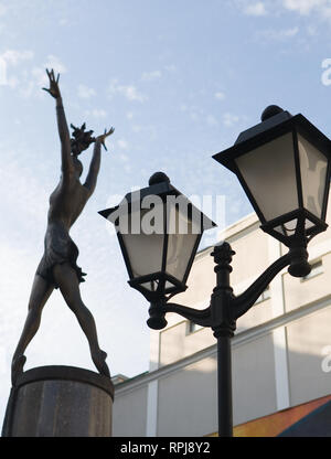 Street lamp on the background of the monument to Maya Plisetskaya. Moscow. Stock Photo